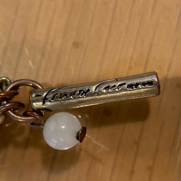 NWT Kenneth Cole long 56 inch gold tone necklace; wear multiple ways. Signed. - Picture 10 of 12